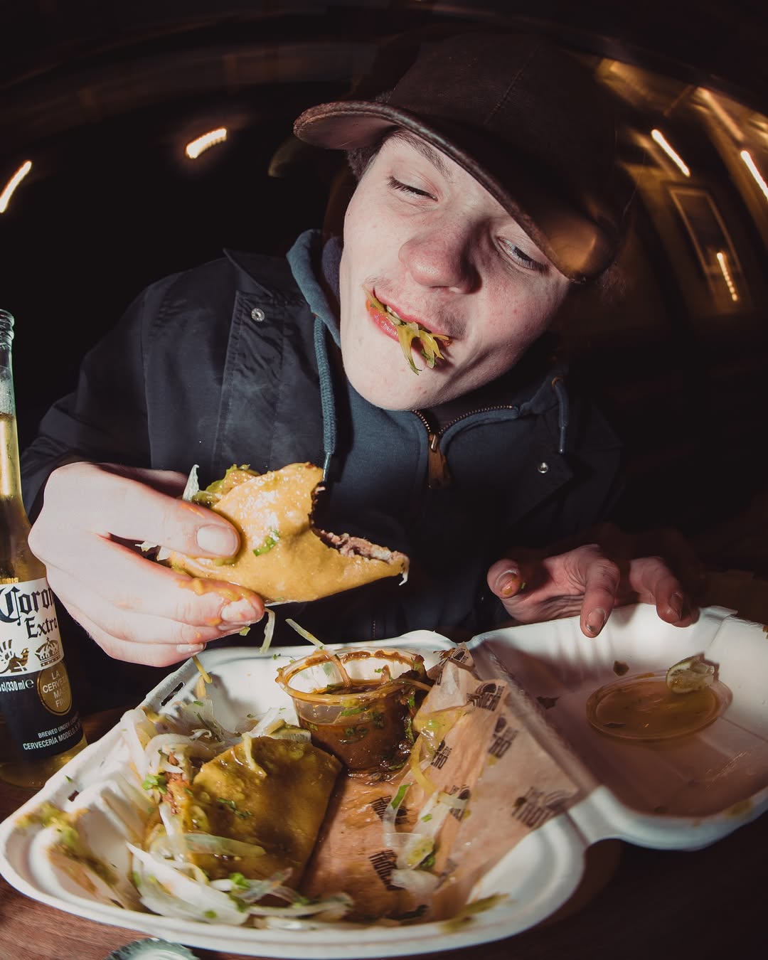 Customers eating tacos